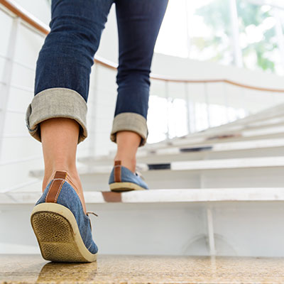 a person walking up a set of stairs